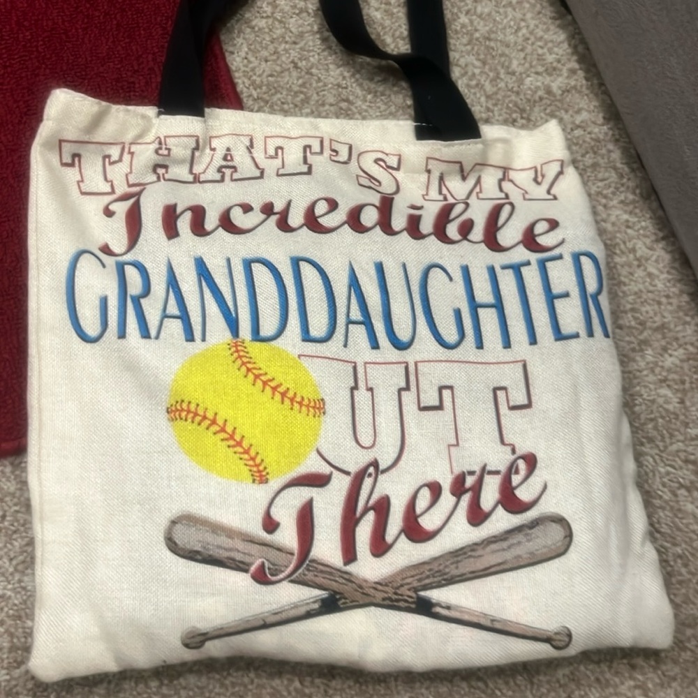 4 tshirts one headband 3 black 1 white and carry bag for softball kid
